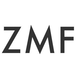 Schwarzes ZMF-Logo auf grauem Hintergrund